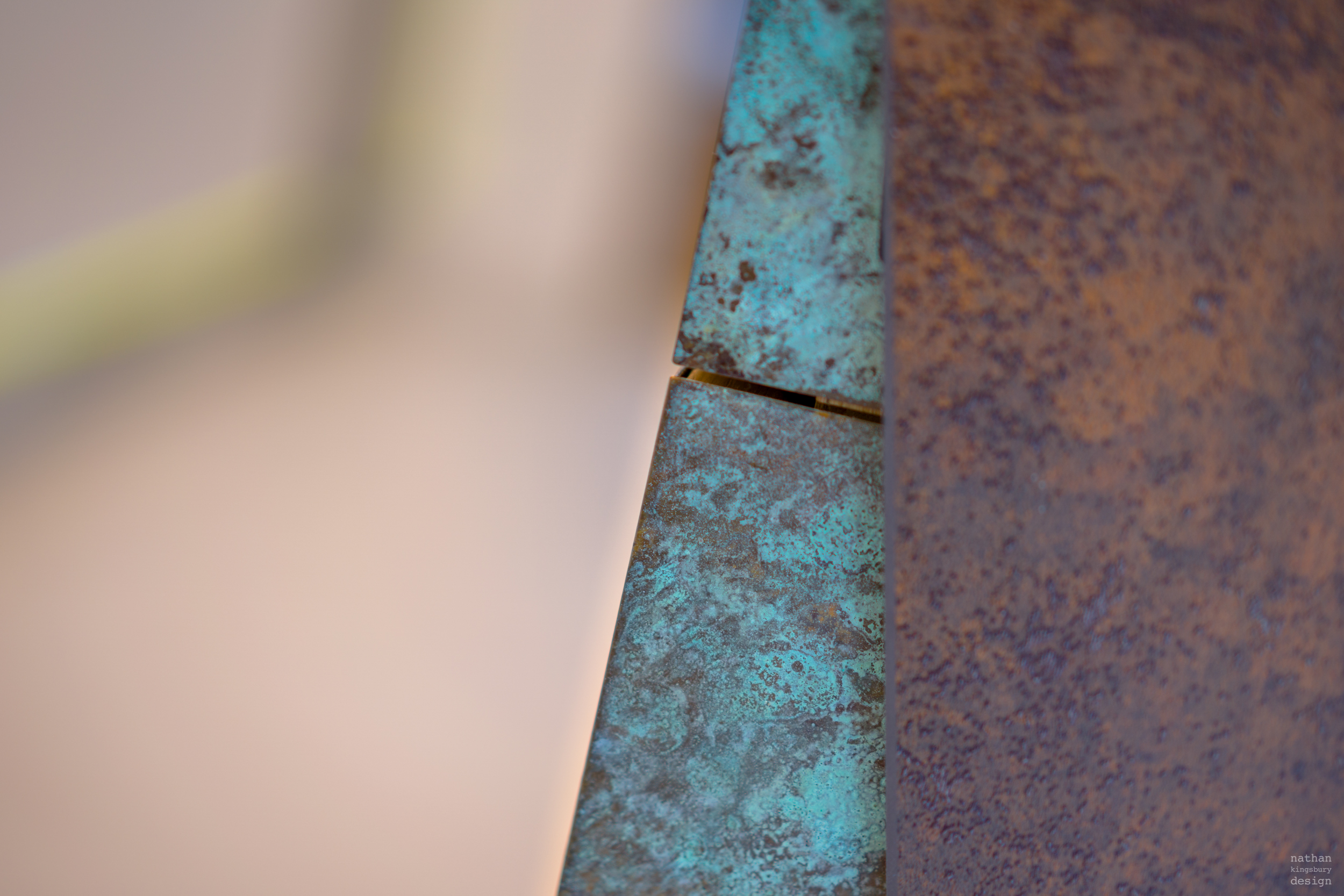 custom made neolith iron corten patinated brass kitchen island clapham south london