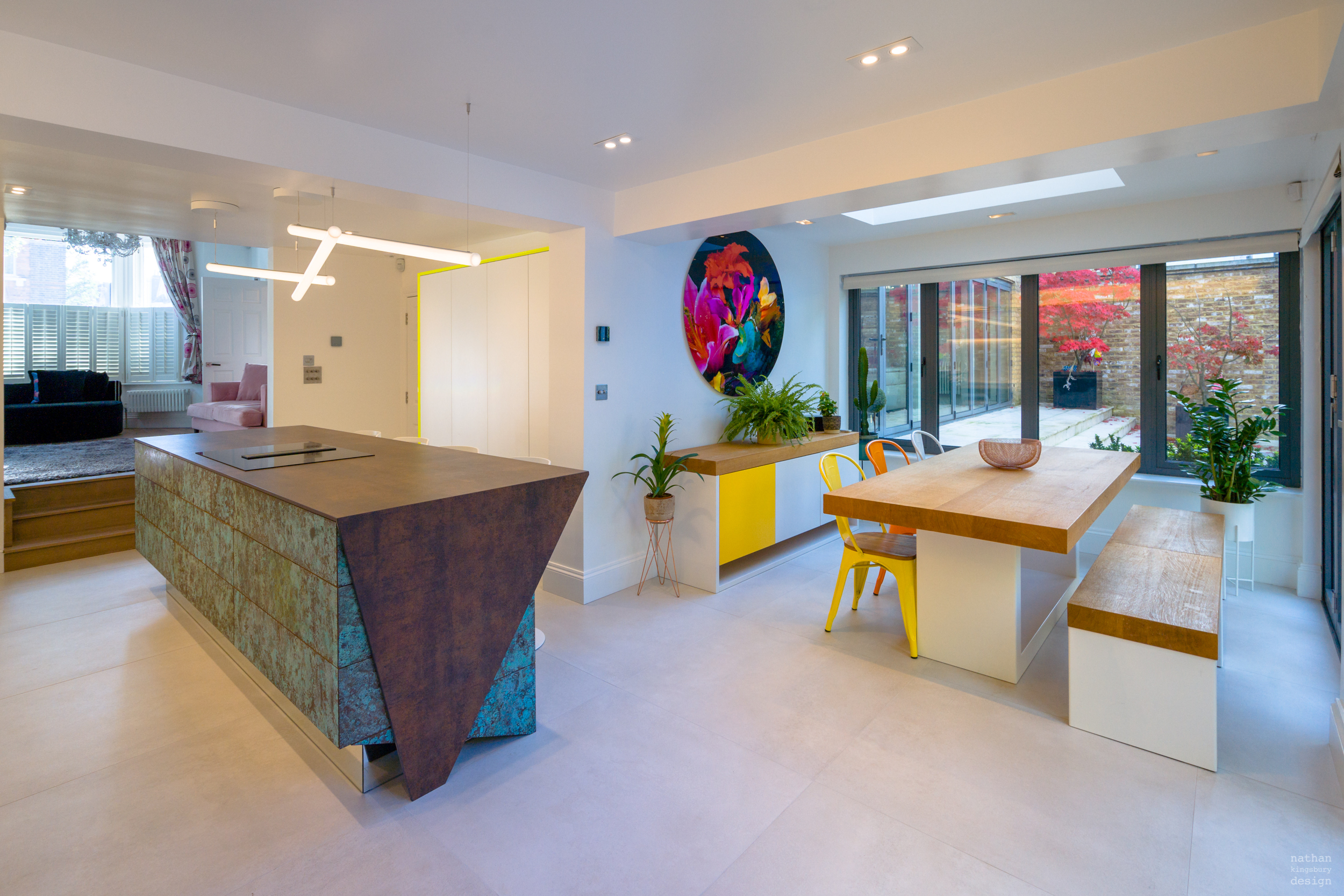 custom made brass verdigris kitchen island with table bench seating clapham south london