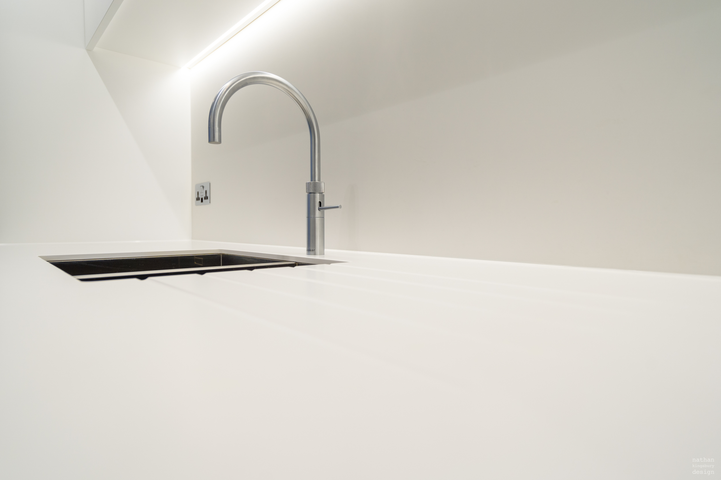 bespoke white minimal kitchen worktop and quooker tap clapham south london