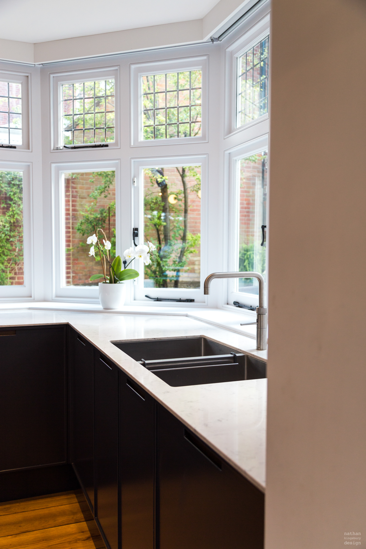 white bespoke kitchen worktop and quooker tap reigate surrey